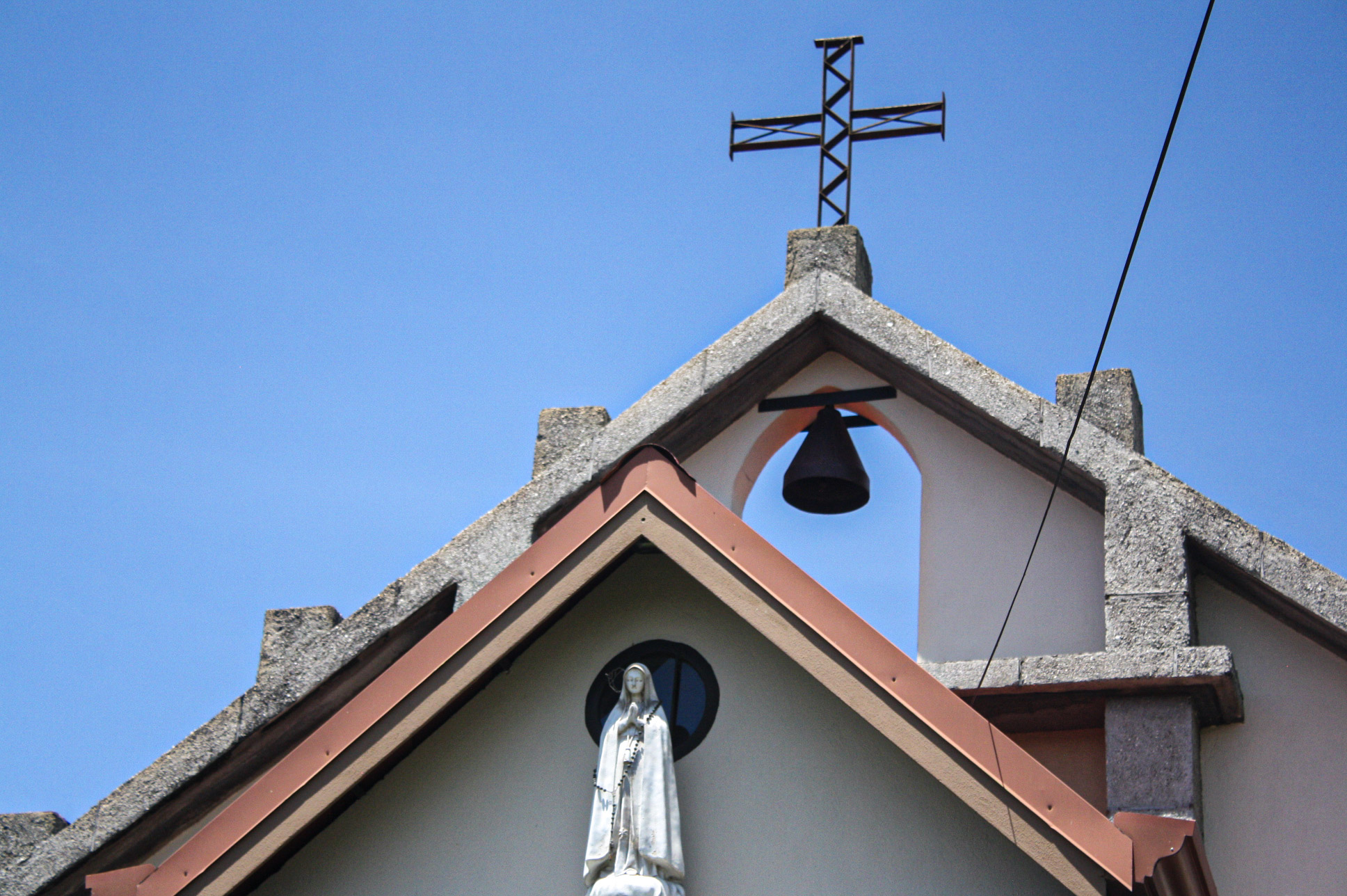 Campana e imagen de Nuestra Señora